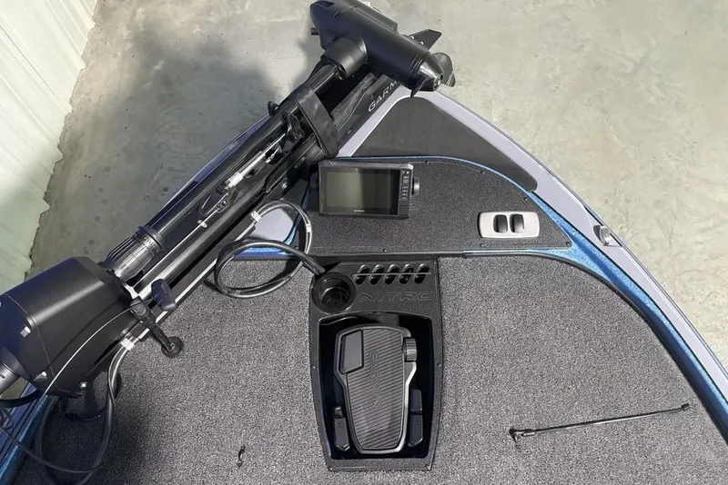 Slide: The Image of 2026 Nitro Z18 Pro boat deck with control panel and foot pedal. - 7