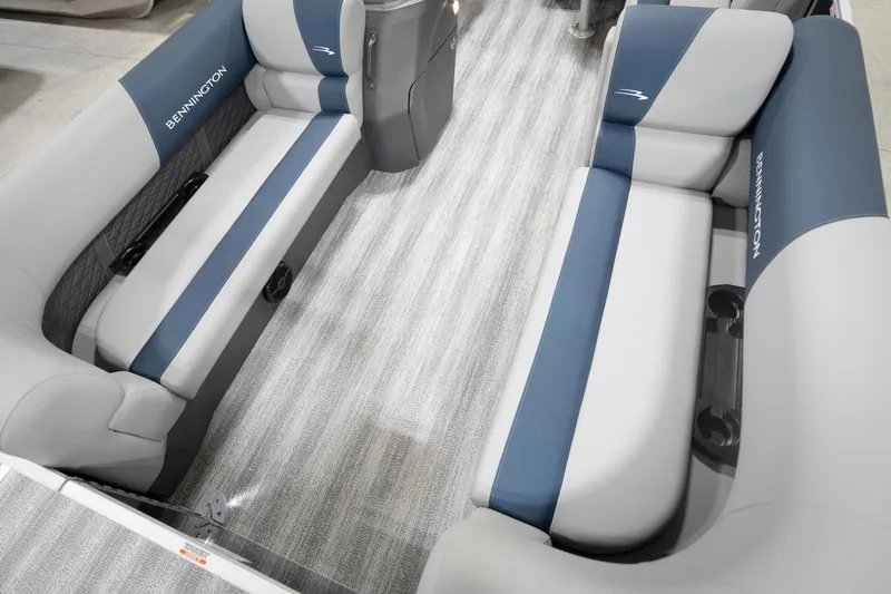 Slide: The Image of 2026 Bennington 20 SFC pontoon boat in indoor showroom with canopy. - 12