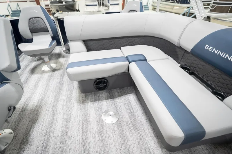 Slide: The Image of 2026 Bennington 20 SFC boat interior with seating and table, featuring modern design. - 26