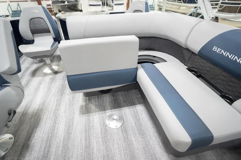 Slide: The Image of 2026 Bennington 20 SFC boat interior with plush seating and modern design. - 27