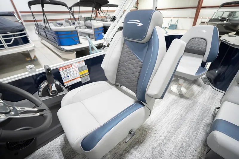 Slide: The Image of 2026 Bennington 20 SFC boat interior with plush seating and modern design. - 29