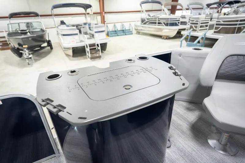 Slide: The Image of 2026 Bennington 20 SFC boat interior with swivel seat and fishing station. - 33