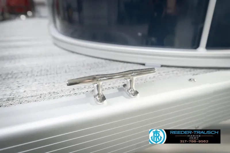 Slide: The Image of 2026 Bennington 20 SFC boat cleat detail with Reeder-Trausch Marine logo. - 63
