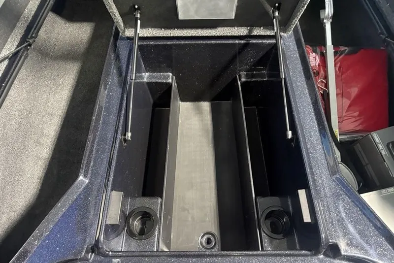 Slide: The Image of Open storage compartment in a 2026 Nitro Z18 Pro boat. - 10