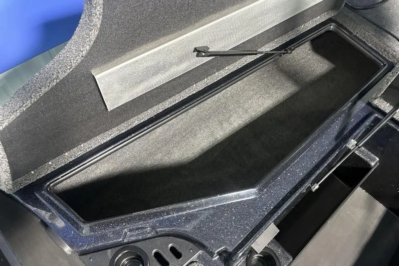 Slide: The Image of Open storage compartment in a 2026 Nitro Z18 Pro boat, featuring a sleek interior design. - 15