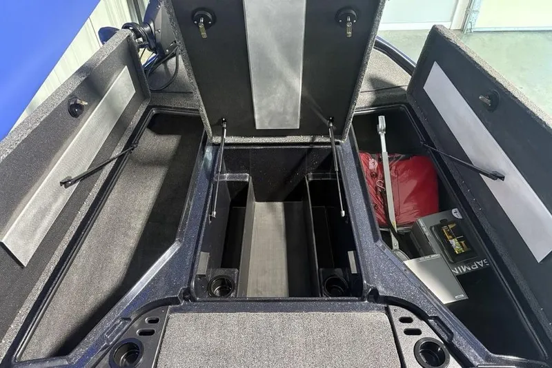 Slide: The Image of Open storage compartments of a 2026 Nitro Z18 Pro boat, showcasing organized interior space. - 16