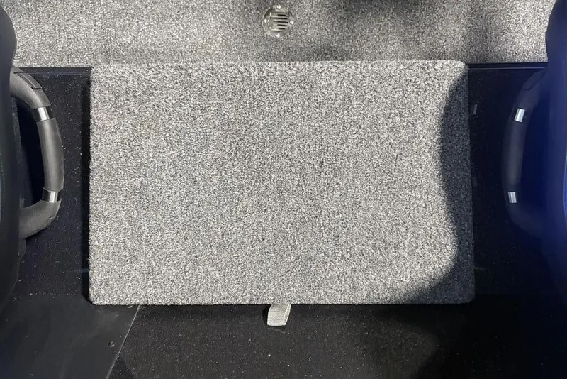 Slide: The Image of Carpeted interior of 2026 Nitro Z18 Pro with handles and textured flooring. - 19