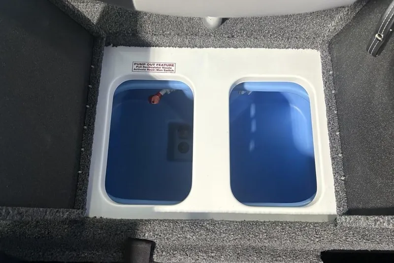 Slide: The Image of Livewell compartments in a 2026 Nitro Z18 Pro boat, featuring pump-out feature. - 26