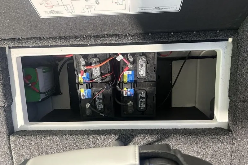 Slide: The Image of Battery compartment of a 2026 Nitro Z18 Pro boat, showing multiple connected batteries. - 33