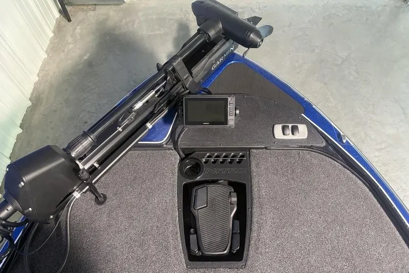 Slide: The Image of 2026 Nitro Z18 Pro boat deck with Garmin electronics and foot pedal controls. - 8