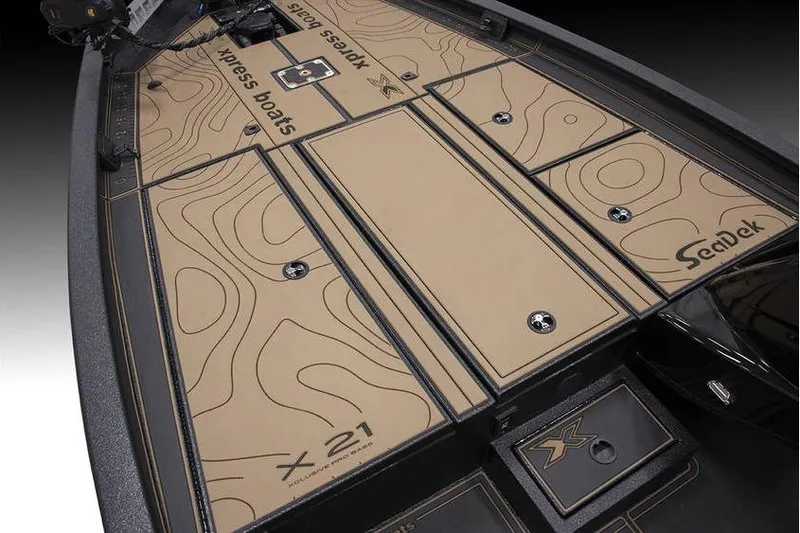 Slide: The Image of 2026 Xpress X21 Pro boat deck with custom SeaDek flooring and storage compartments. - 3