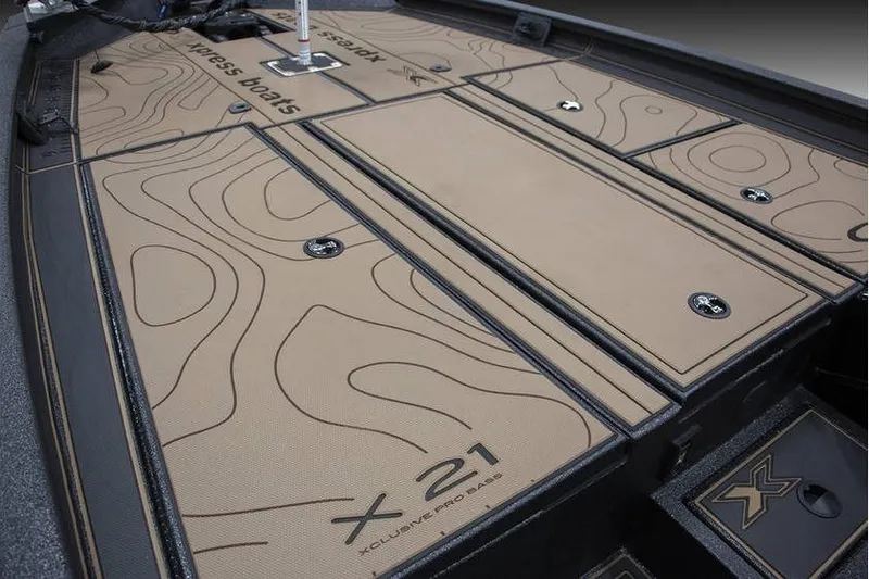 Slide: The Image of 2026 Xpress X21 Pro boat deck with stylish contour design and secure storage compartments. - 5