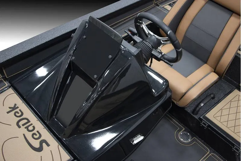 Slide: The Image of 2026 Xpress X21 Pro boat interior with sleek black console and tan seating. - 9