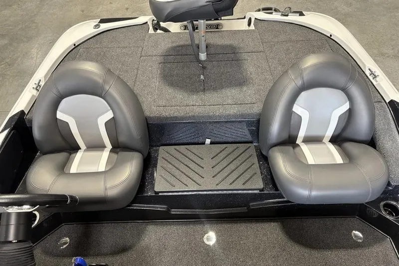 Slide: The Image of 2026 Nitro Z17 boat interior with two gray seats and a central platform. - 12