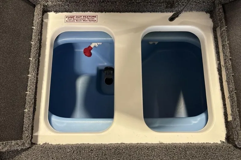 Slide: The Image of Livewell compartments in a 2026 Nitro Z17 boat, featuring pump-out feature. - 21