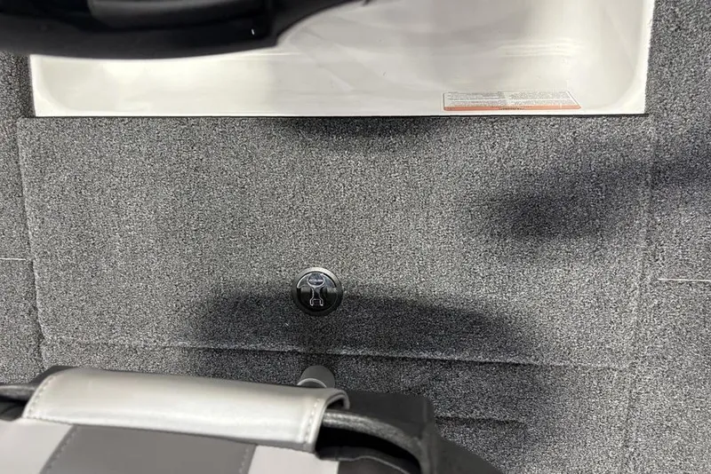 Slide: The Image of Carpeted floor of a 2026 Nitro Z17 boat with a visible seat base. - 27