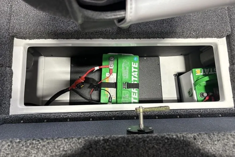 Slide: The Image of Battery compartment of a 2026 Nitro Z17 boat, featuring Interstate batteries. - 28