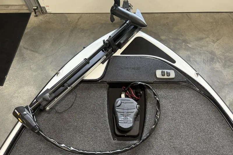 Slide: The Image of 2026 Nitro Z17 boat deck with trolling motor and control panel. - 8