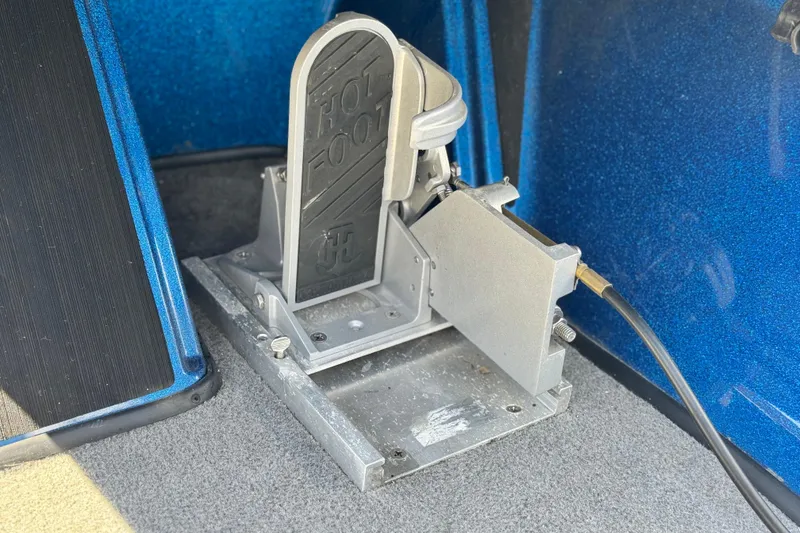 Slide: The Image of Nitro Z19 2022 boat foot pedal, blue interior, close-up view. - 20