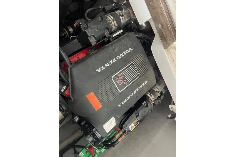 Slide: The Image of Volvo Penta engine in a 2003 Cobalt 282 boat, showcasing mechanical components. - 14