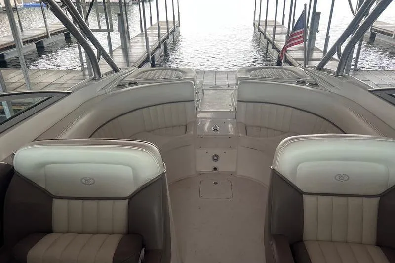 Slide: The Image of Interior of a 2003 Cobalt 282 boat docked at a marina. - 4