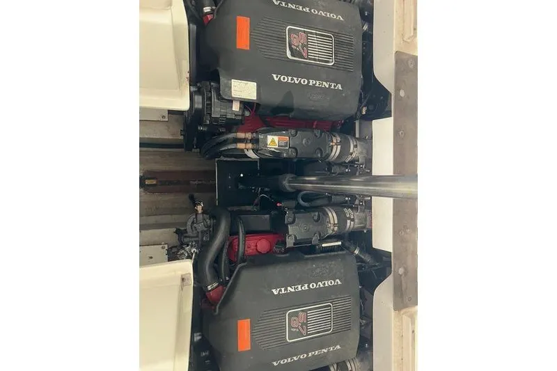 Slide: The Image of Twin Volvo Penta engines in a 2003 Cobalt 282 boat. - 7