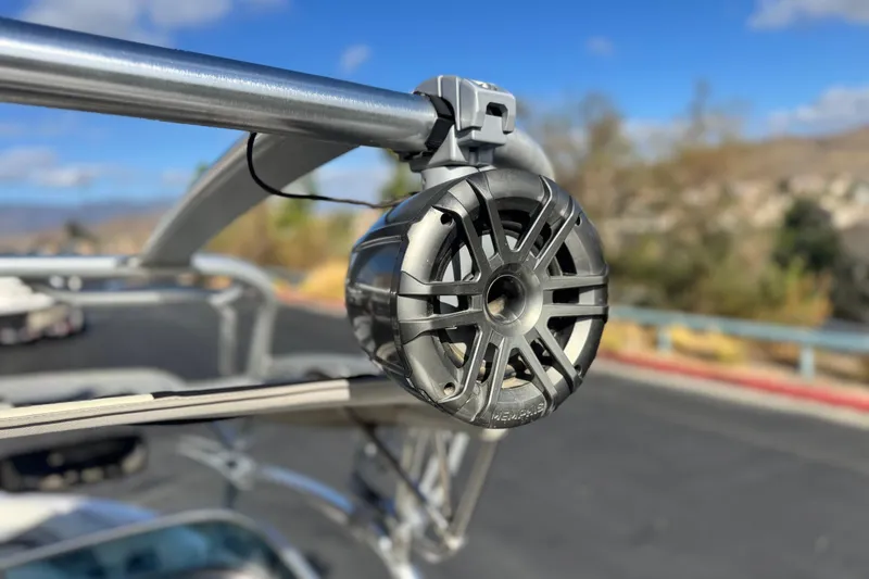 Slide: The Image of Close-up of a 2006 Correct Craft Super Air Nautique 210 Sport boat speaker. - 11