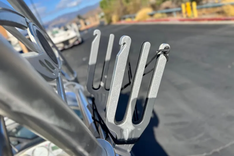 Slide: The Image of Close-up of a 2006 Correct Craft Super Air Nautique 210 Sport wakeboard rack. - 12