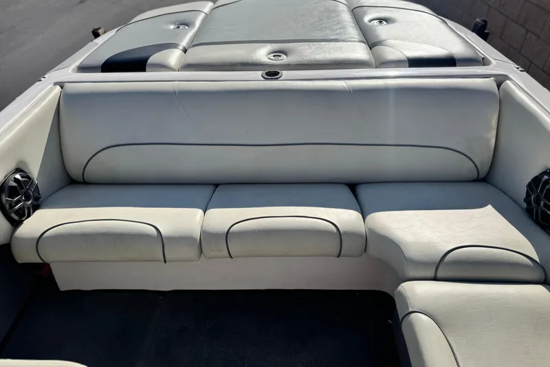 Slide: The Image of 2006 Correct Craft Super Air Nautique 210 Sport boat interior seating. - 18