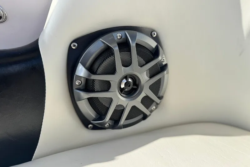 Slide: The Image of Close-up of a speaker on a 2006 Correct Craft Super Air Nautique 210 Sport boat. - 28