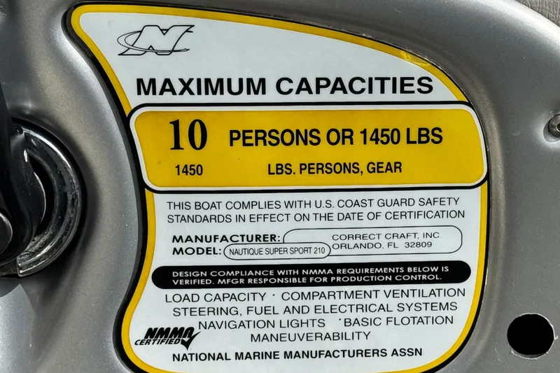 Slide: The Image of 2006 Correct Craft Super Air Nautique 210 Sport capacity label, 10 persons or 1450 lbs. - 31
