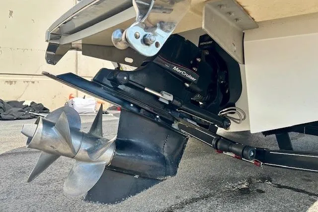 Slide: The Image of 2015 Cobalt 220S boat with MerCruiser outdrive and stainless steel propeller. - 5