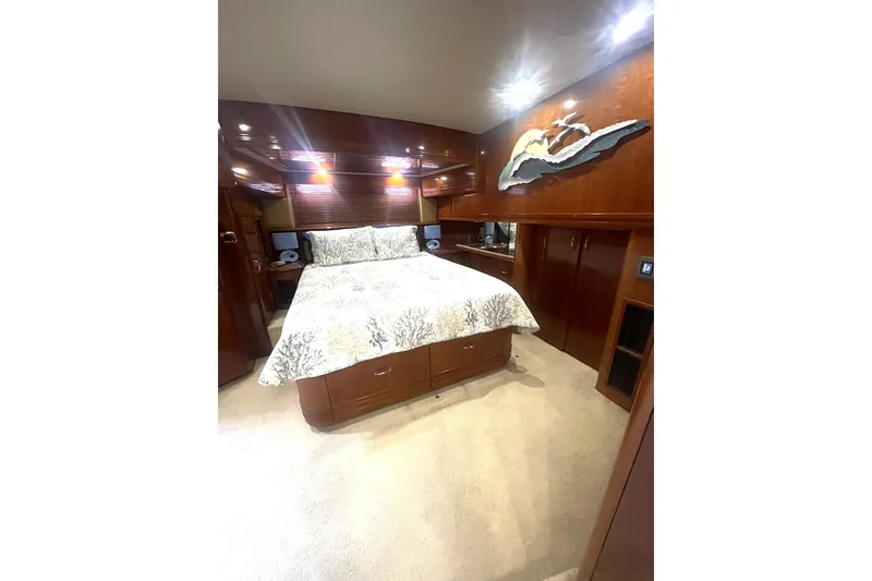 Slide: The Image of Luxurious bedroom interior of 2004 Carver 570 Voyager Pilothouse yacht. - 27
