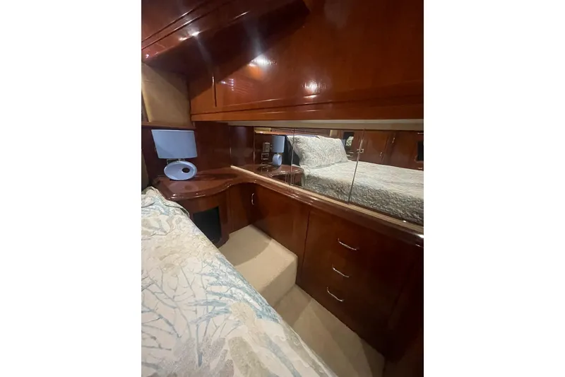 Slide: The Image of Luxurious bedroom interior of 2004 Carver 570 Voyager Pilothouse yacht. - 28