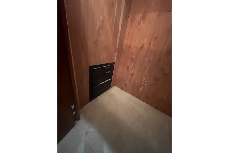 Slide: The Image of Wooden closet interior on 2004 Carver 570 Voyager Pilothouse yacht. - 32