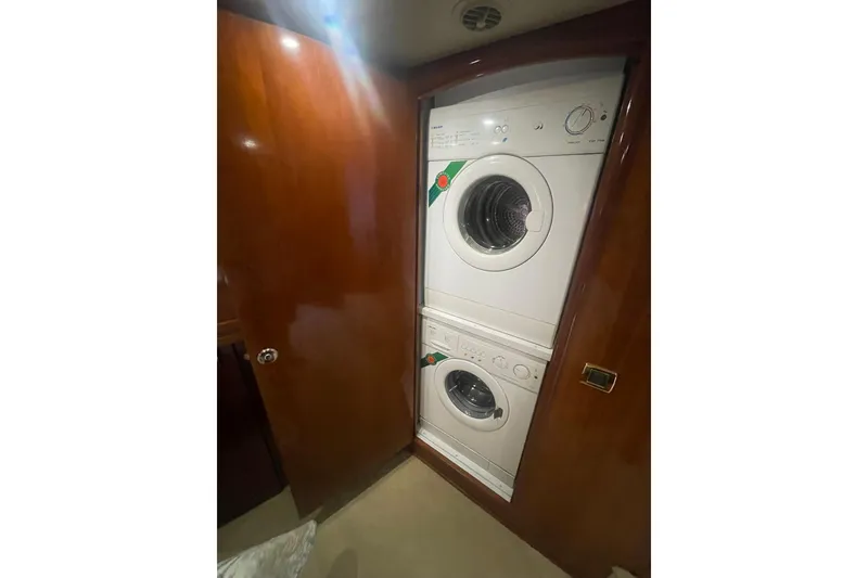 Slide: The Image of Wood-paneled interior of 2004 Carver 570 Voyager Pilothouse with vented panel. - 33
