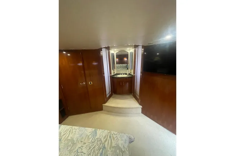 Slide: The Image of Stacked washer and dryer in 2004 Carver 570 Voyager Pilothouse yacht. - 34