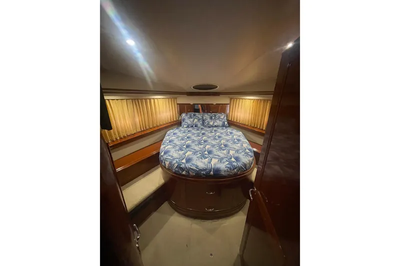 Slide: The Image of Interior hallway of 2004 Carver 570 Voyager Pilothouse with wooden cabinetry and decor. - 40