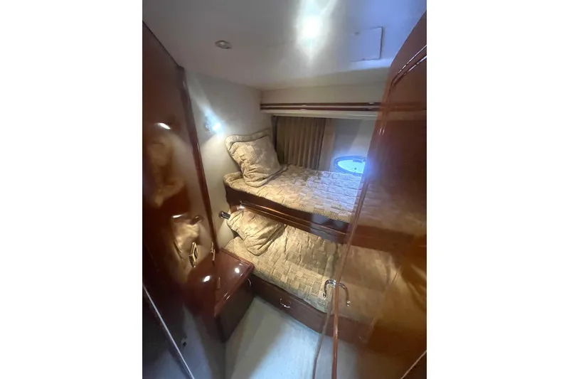 Slide: The Image of Shower area in 2004 Carver 570 Voyager Pilothouse yacht with porthole and handheld showerhead. - 46