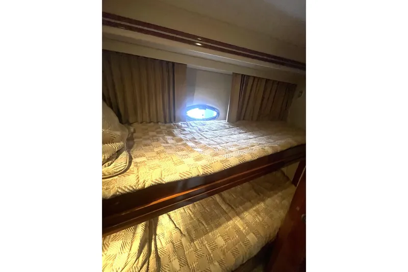 Slide: The Image of Cozy cabin with bunk beds in 2004 Carver 570 Voyager Pilothouse yacht. - 47