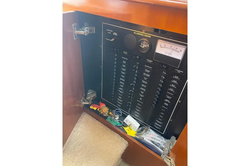Slide: The Image of Electrical control panel inside a 2004 Carver 570 Voyager Pilothouse yacht. - 60