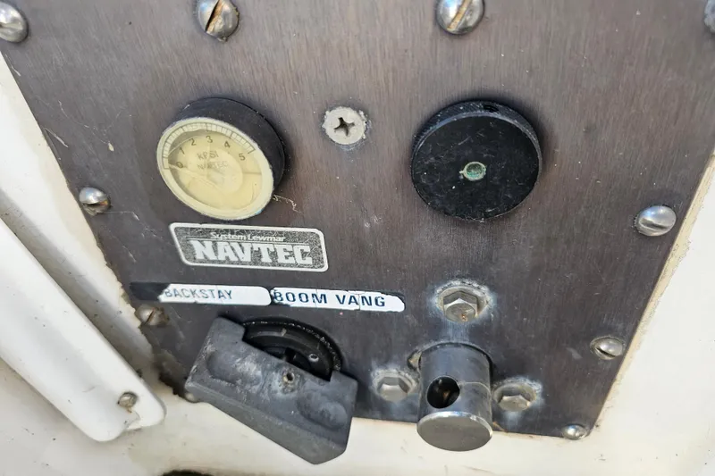 Slide: The Image of Raymarine navigation instruments on a 1980 Nautor Swan 47 yacht dashboard. - 18