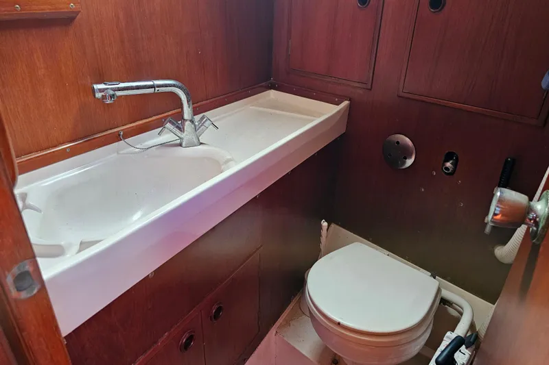 Slide: The Image of Battery compartment of a 1980 Nautor Swan 47 sailboat with wiring connections. - 35