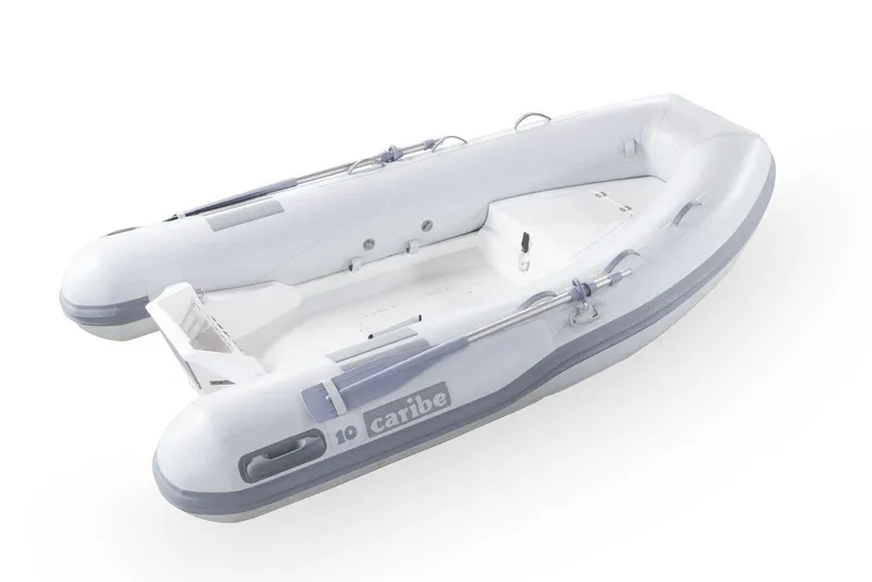 The Image of 2025 Caribe MPV 10 inflatable boat, white with gray accents, top view. - 1