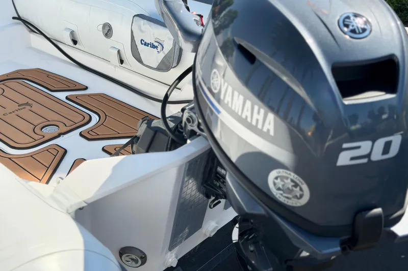 Slide: The Image of Yamaha 20hp w Power trim and start $5200 Yamaha 20hp pull start manual trim $4200 Yamaha 20hp electric start manual trim $4800 - 12