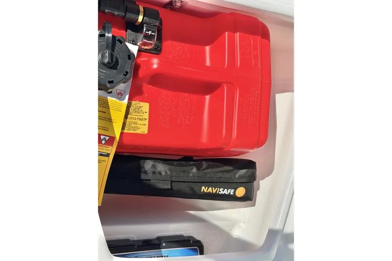 Slide: The Image of Red fuel container and Navisafe bag in Caribe MPV 10, 2025 model. - 32