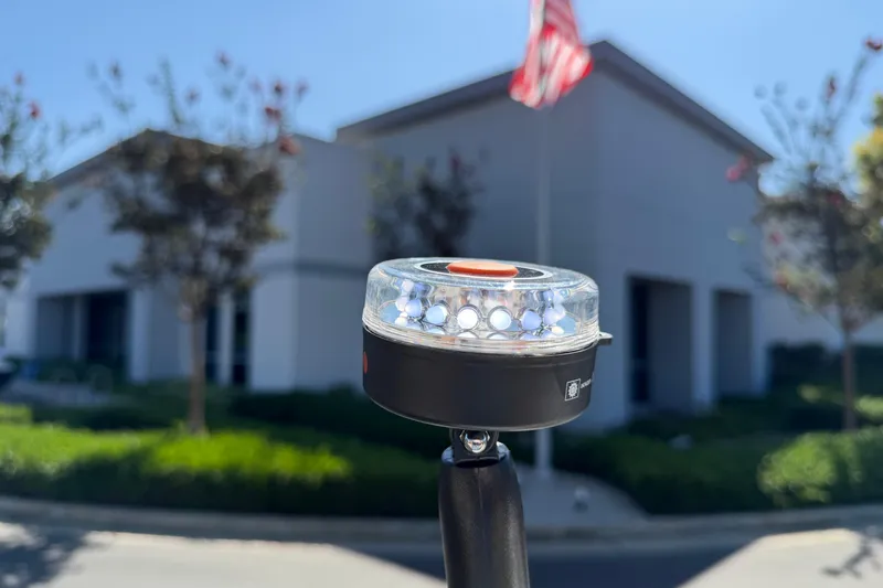 Slide: The Image of Close-up of a modern LED light against a blurred building background. - 39