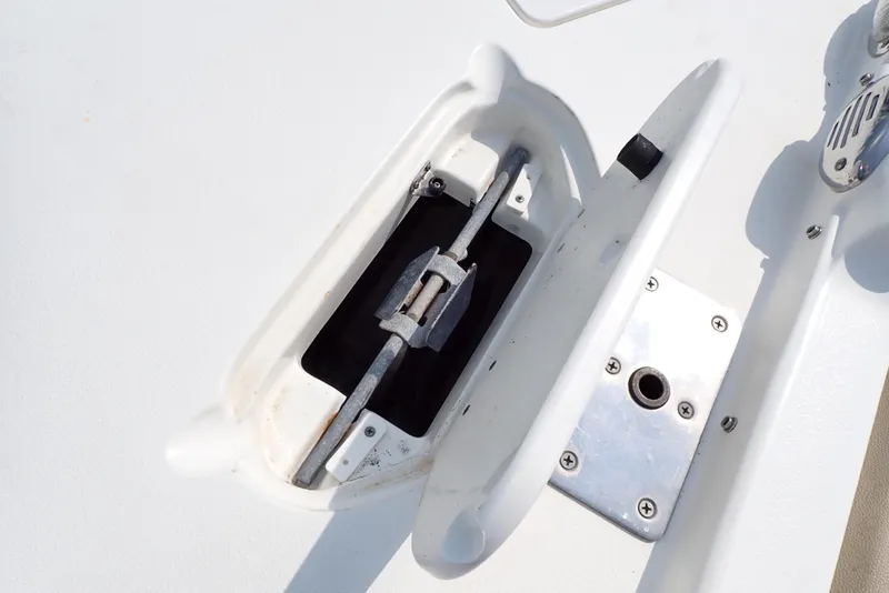 Slide: The Image of 2019 NauticStar 243DC Sport Deck boat cleat and hardware detail. - 28