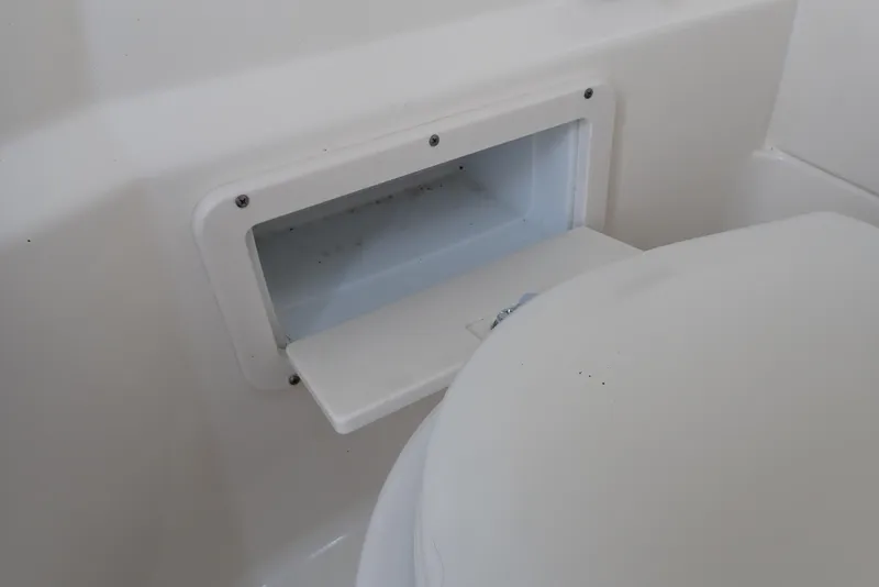 Slide: The Image of 2019 NauticStar 243DC Sport Deck boat interior storage compartment. - 48