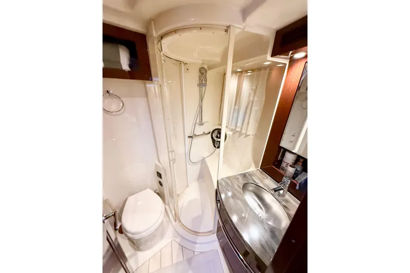Slide: The Image of Luxurious bathroom in 2014 Sea Ray 580 Sundancer yacht with shower and sink. - 23